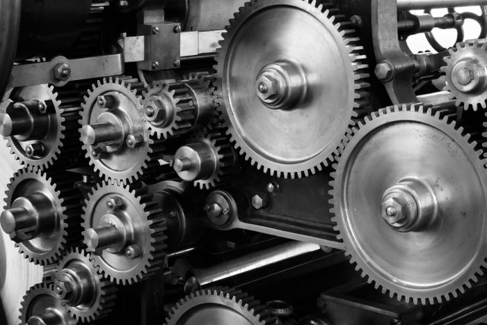 Close-up of industrial gears and machine components