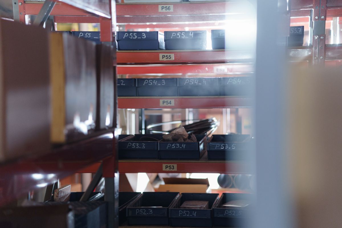 Rows of industrial spare parts inventory in a warehouse